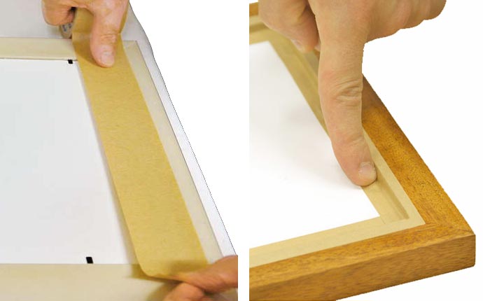 laying-picture-framing-tape-along-the back-of-the-picture-frame-to-seal-it